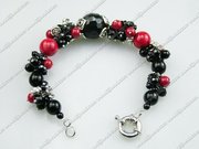 $5.28 for black agate and red alaqueca bracelet at www.bjbead.com